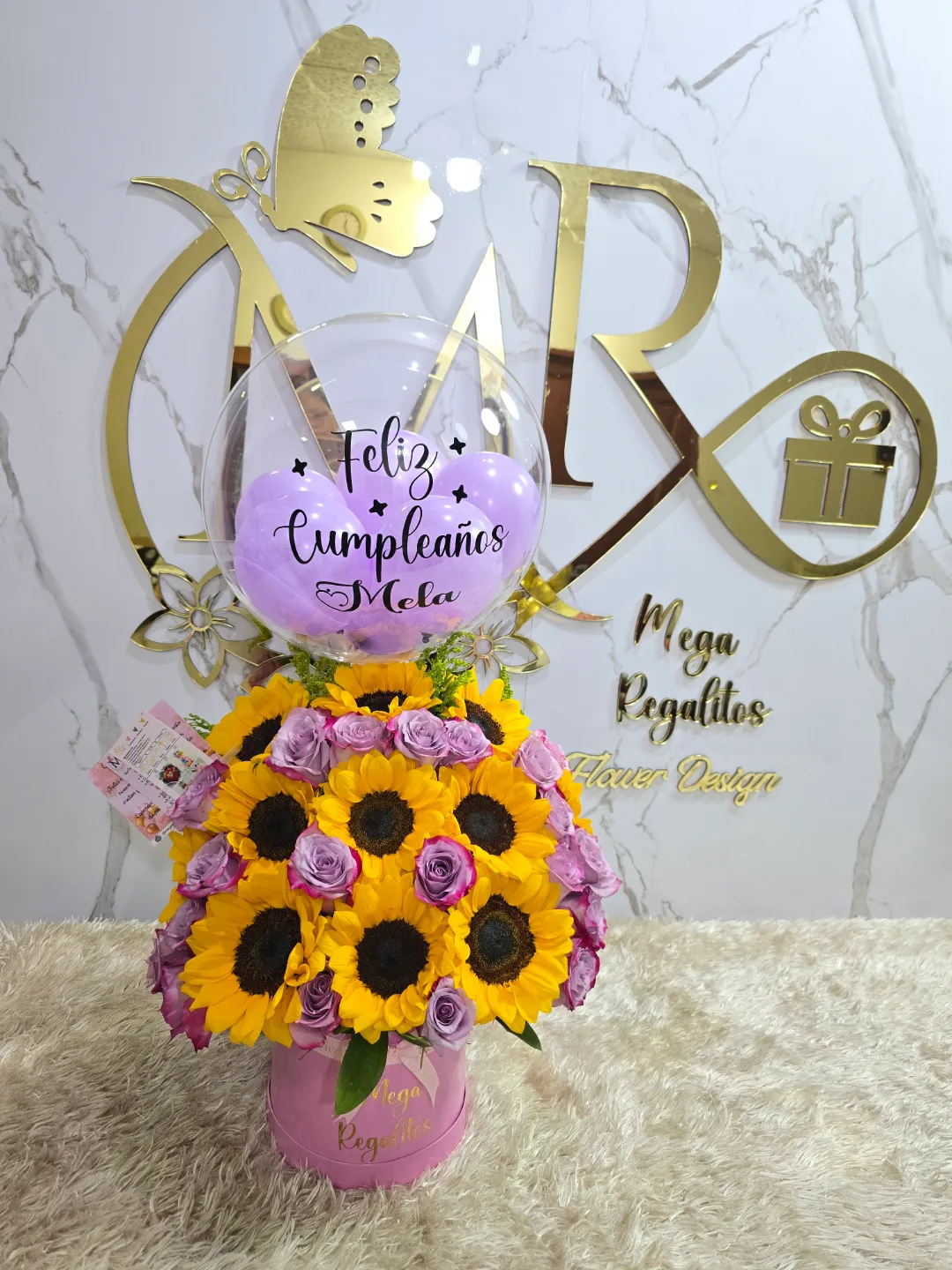 Box de rosas lilas y girasoles